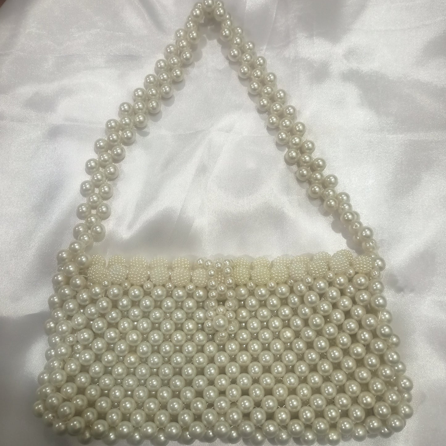 Ivory pearl hand bag