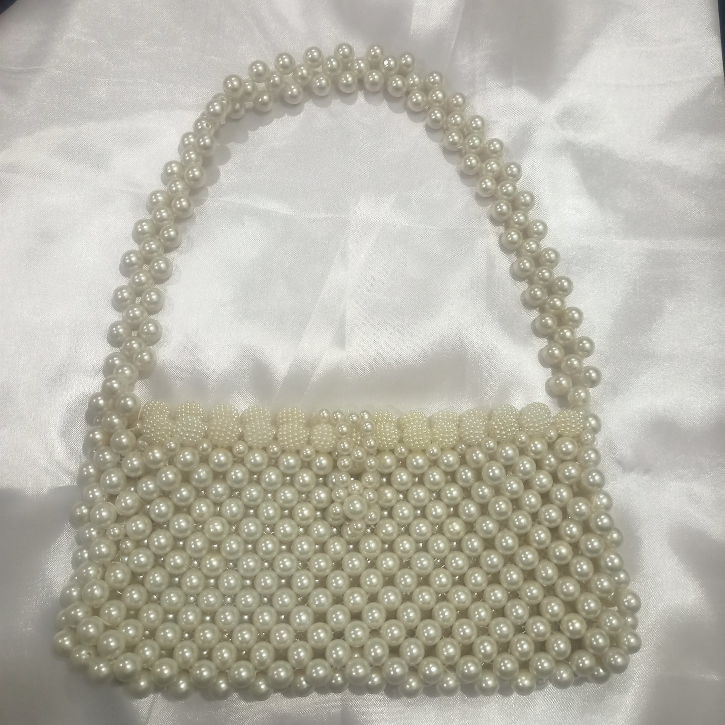 Ivory pearl hand bag