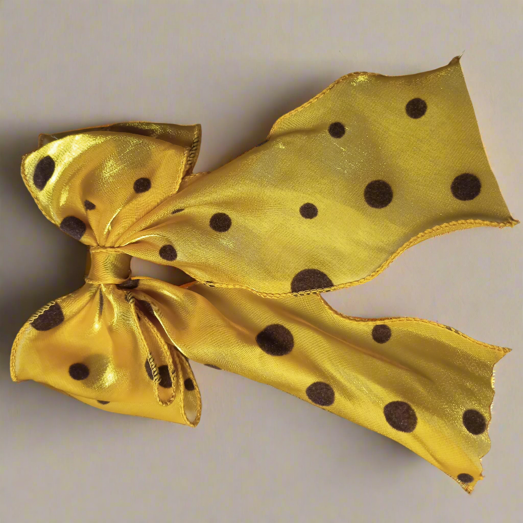 Polka dotted satin bow clips
