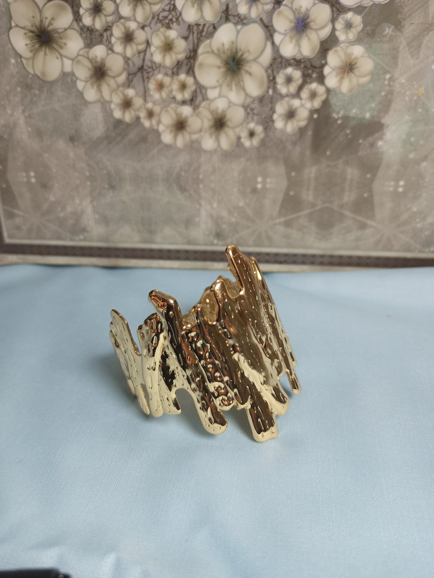 Textured golden cuff bracelet