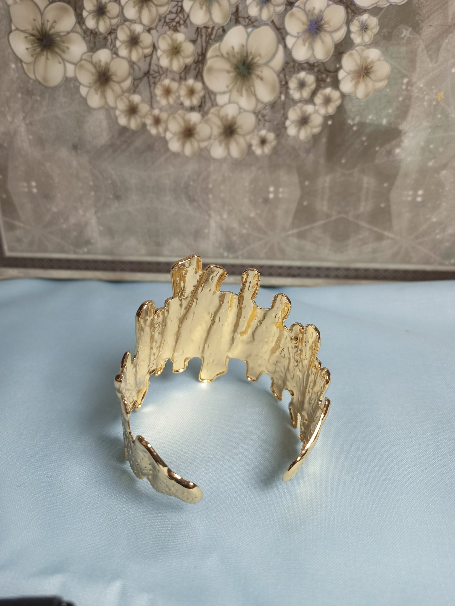 Textured golden cuff bracelet