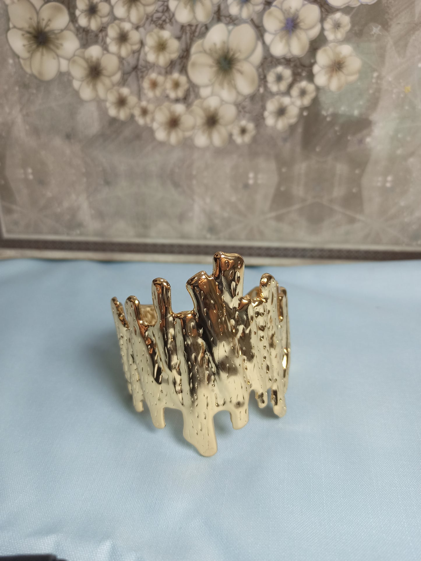 Textured golden cuff bracelet