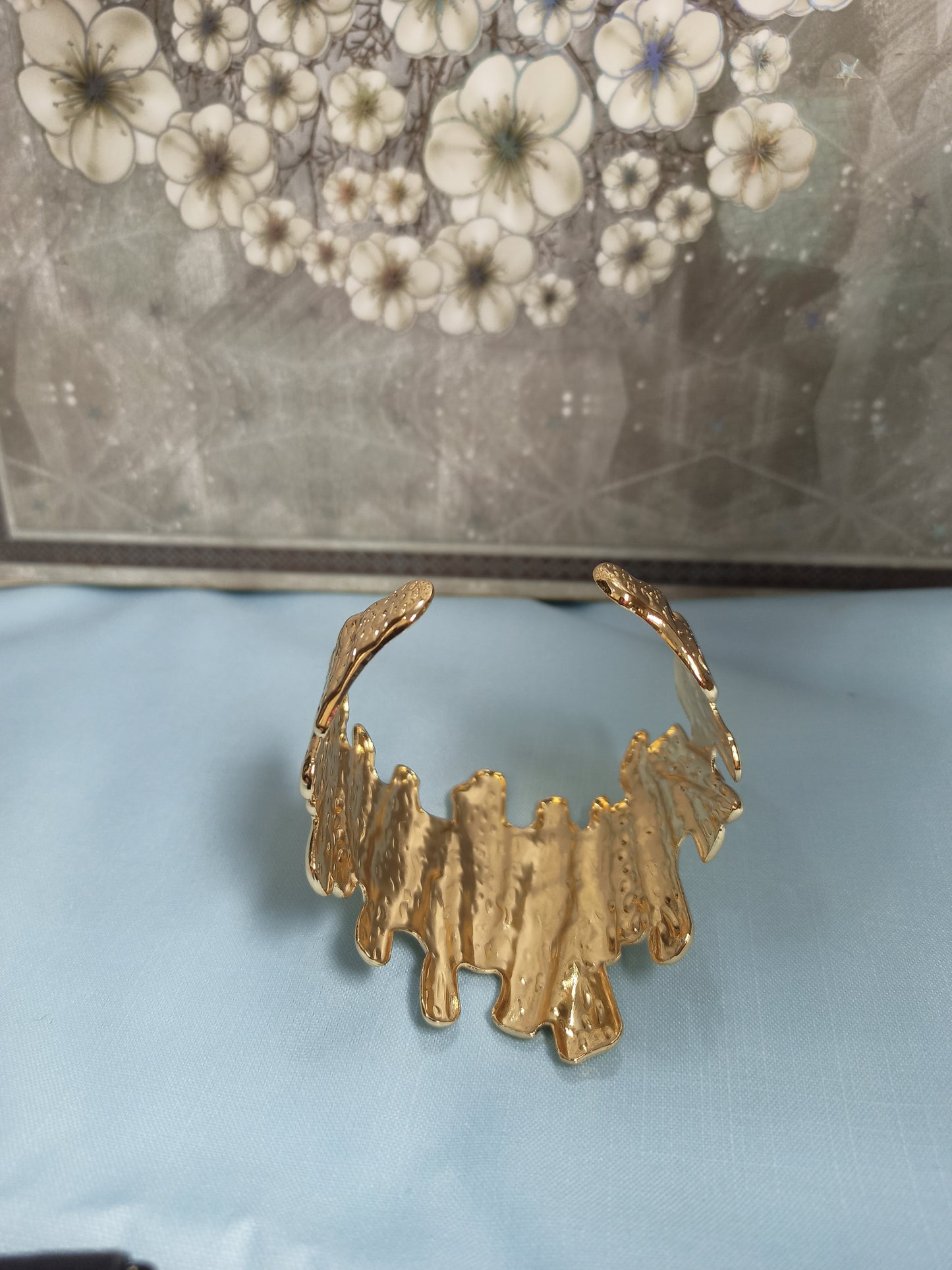 Textured golden cuff bracelet